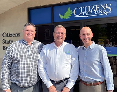 Kirby Purciful, Chris Whitesell, Dan Maddox outside Main Office