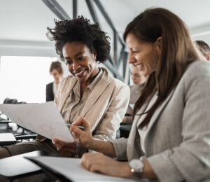 women looking over paperwork