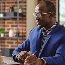 Business Man Reviewing His Bank Accounts