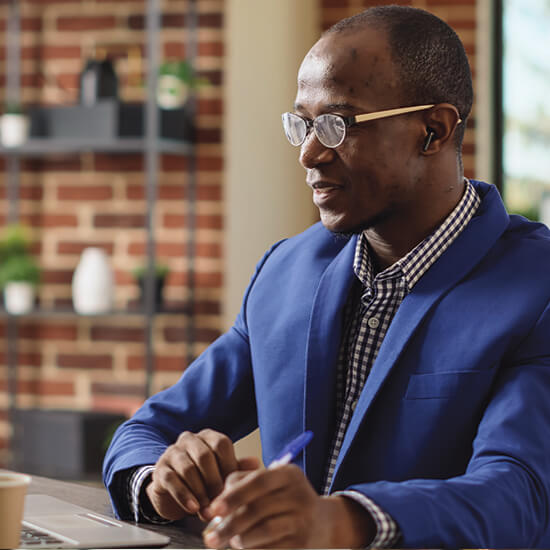 Business Man Reviewing His Bank Accounts