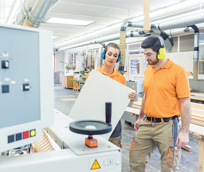 workers in small manufacturing facility