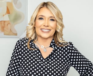 photograph of Sherri Gibson wearing a polka-dot shirt